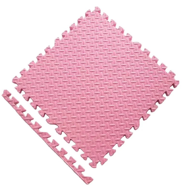 Pink interlocking foam mat with dimensions and thickness on a white background